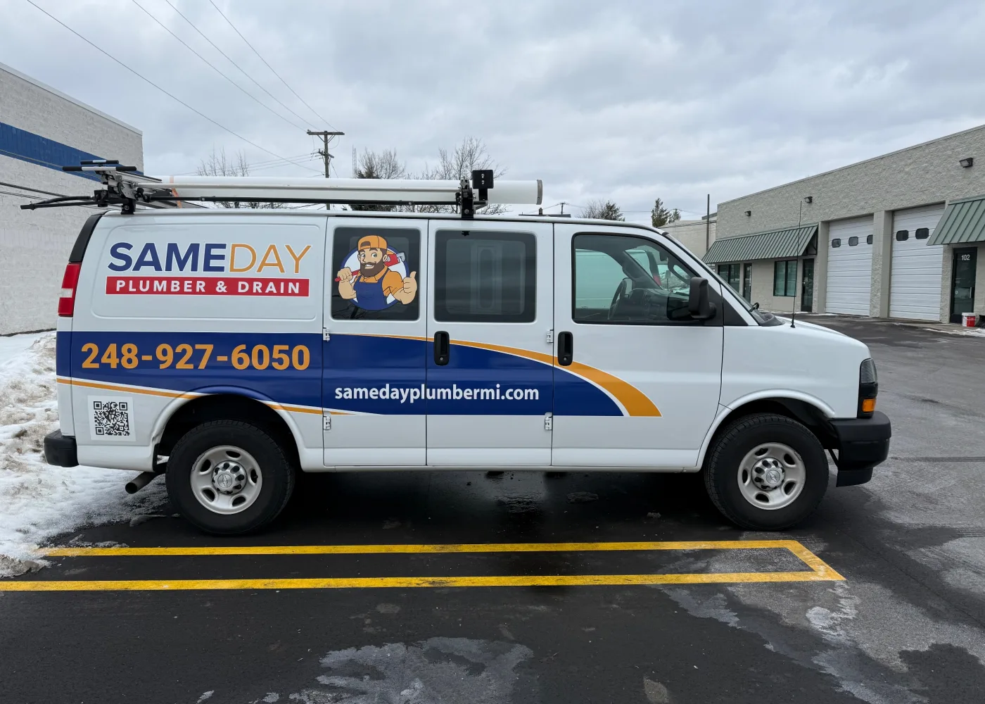 Side of the Same Day Plumber & Drain service van